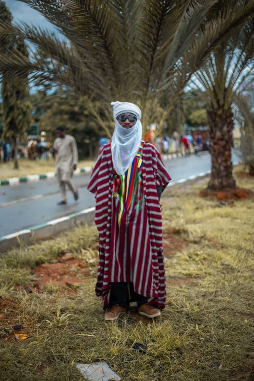Free Person in traditional Nigerian attire outdoors, capturing rich cultural heritage. Stock Photo