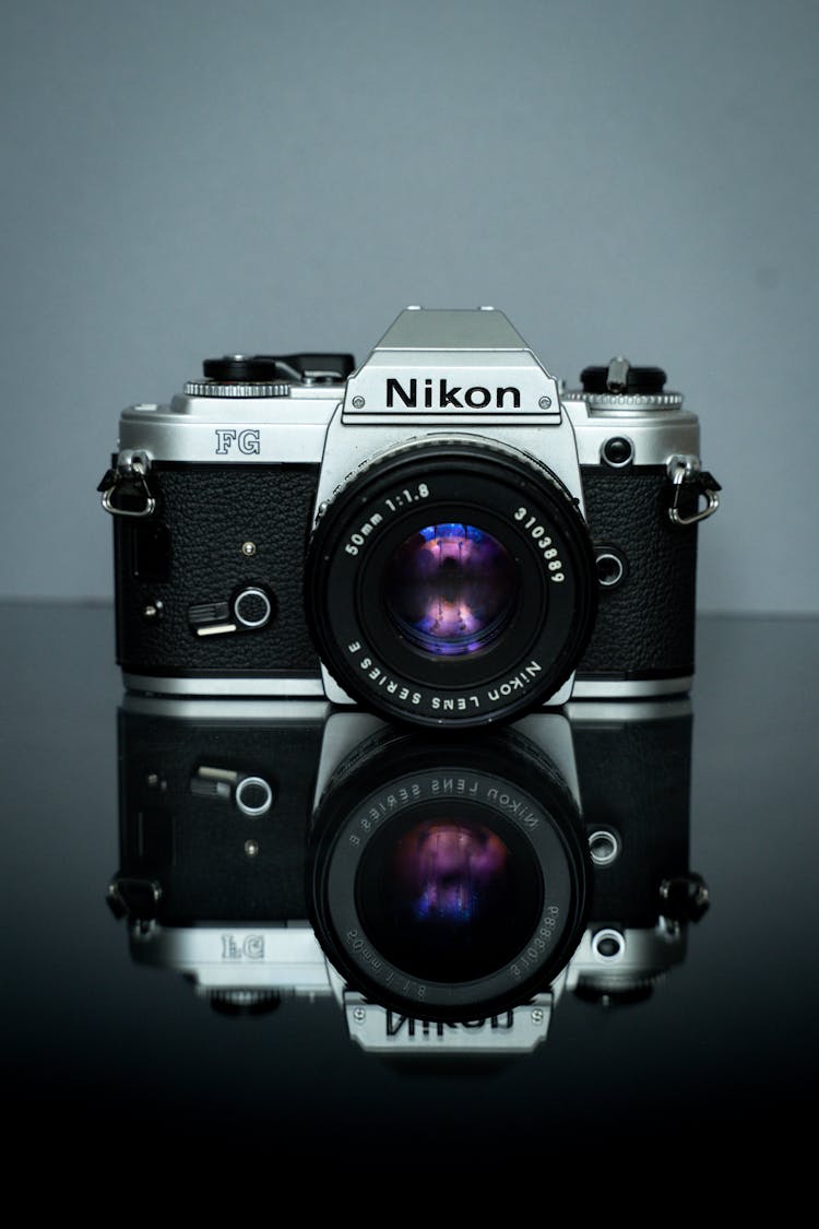 Black And Silver Nikon Camera