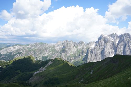 Free Scenic view of the Prokletije mountains under a vibrant blue sky in Lëpushë, Shkodër County, Albania. Stock Photo