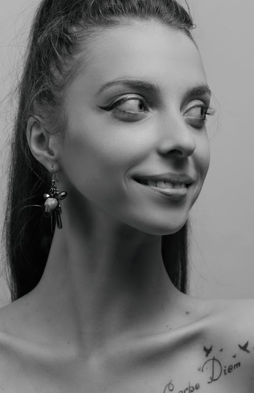 Black And White Photo Of A Woman Smiling