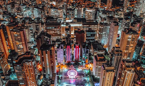 Free Aerial View Of City Buildings During Night Time Stock Photo