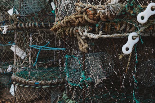 Cylindrical fishing nets storage at pier