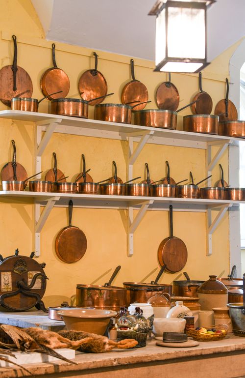 Free Authentic copper cookware in a historic kitchen setting at Inveraray Castle, Scotland. Stock Photo