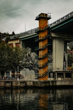 Artistic view of a bridge mural in Bilbao, Spain. Perfect for urban art lovers.