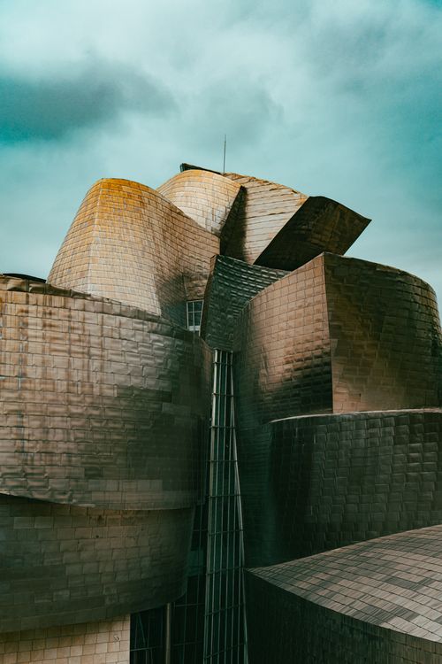 Free Stunning view of the Guggenheim Museum in Bilbao showcasing its modern architecture and unique design. Stock Photo