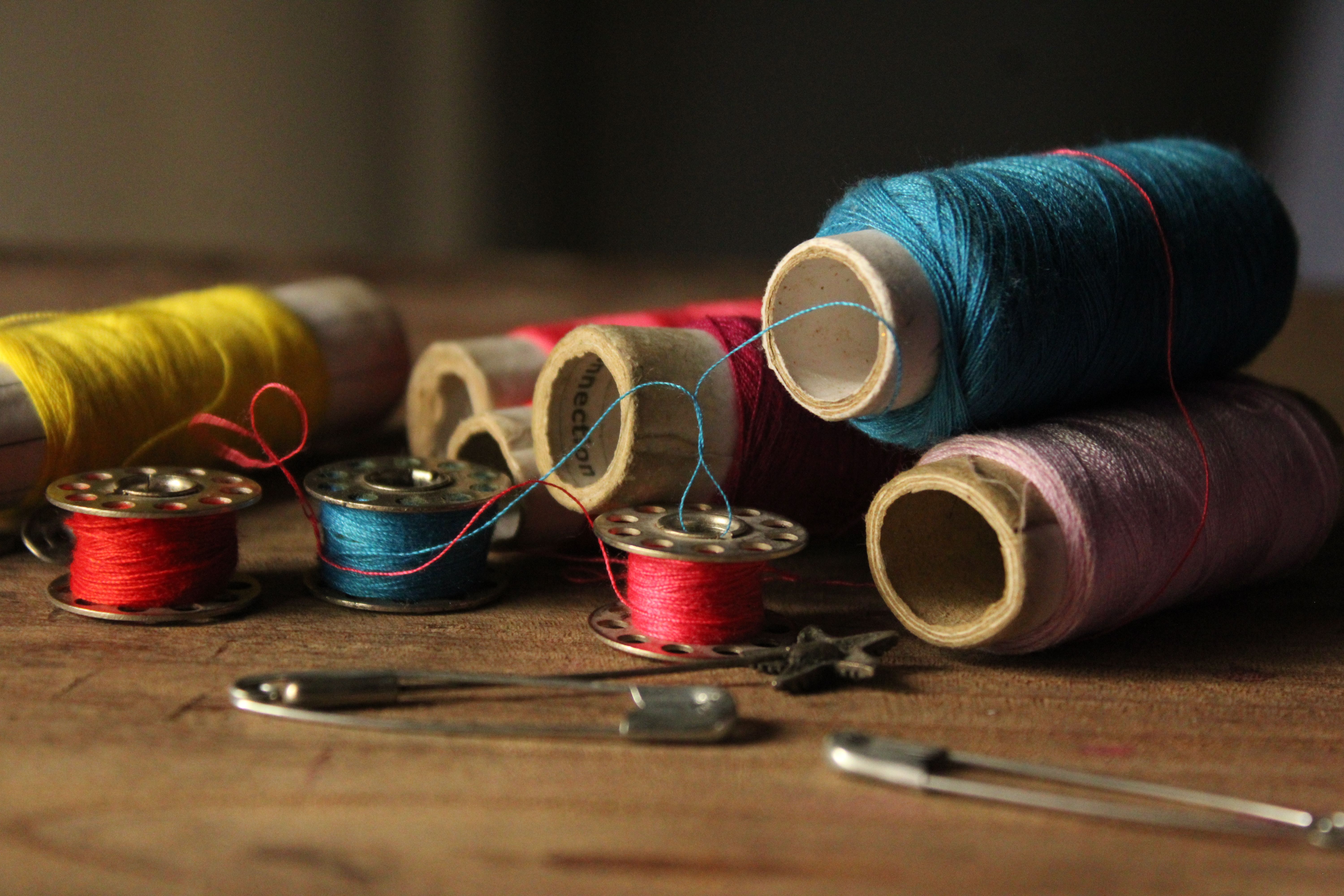 Paper pulp, paper or paperboard; bobbins, spools, cops and similar supports, of a kind used for winding textile yarn (whether or not perforated or hardened)