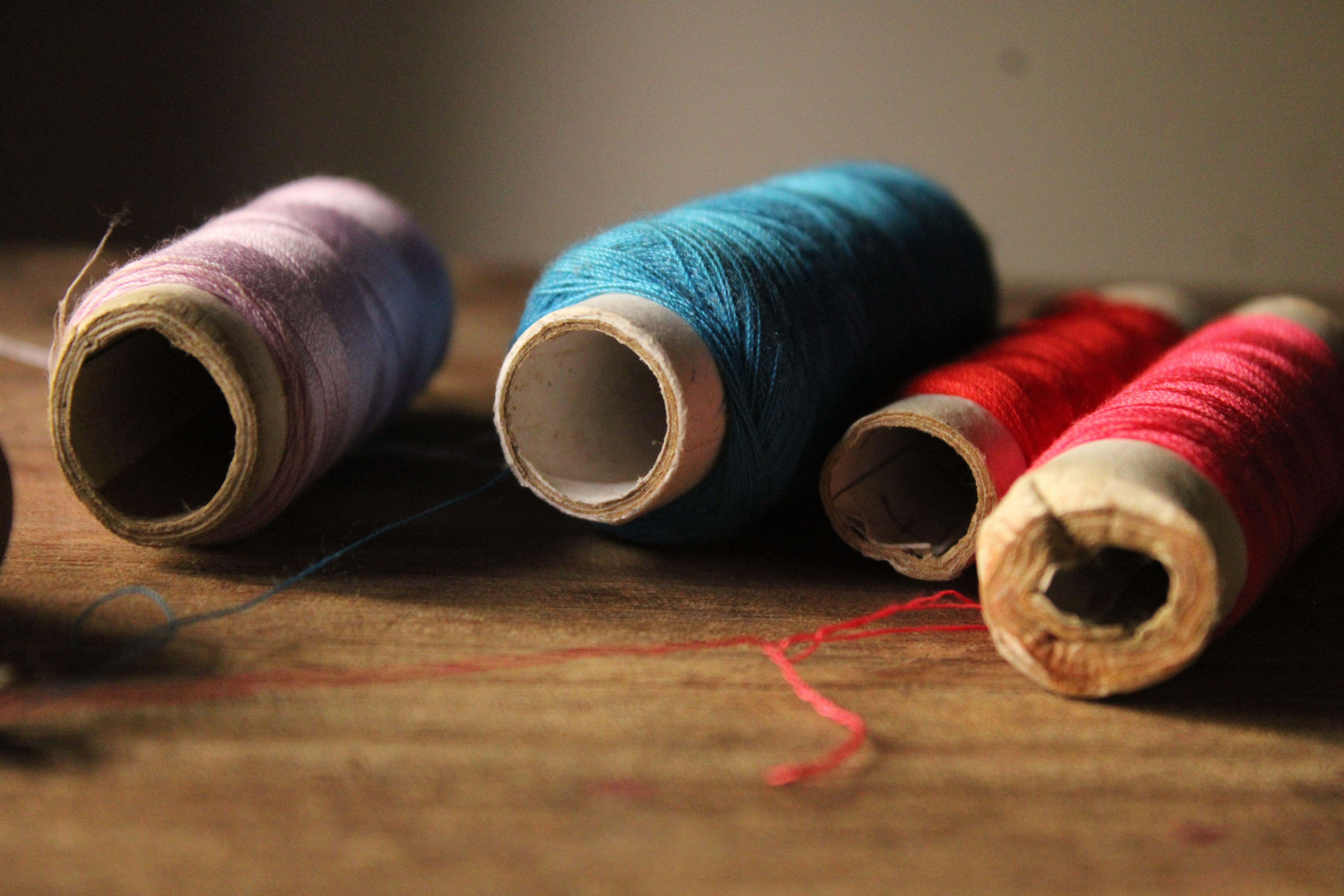 Track suits and other garments n.e.c.; men's or boys', of man-made fibres (not knitted or crocheted)