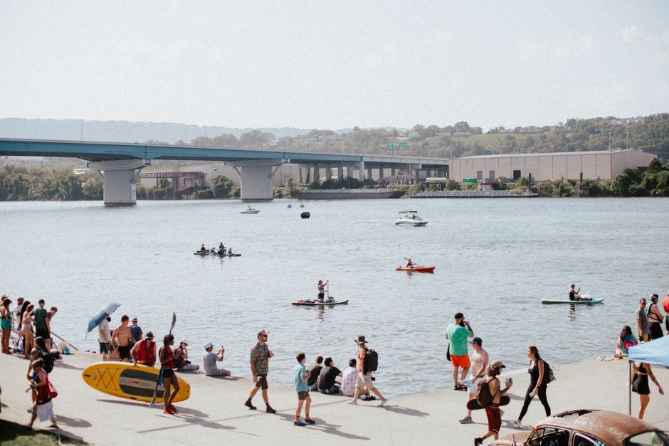 People enjoying outdoor recreational activities at Chattanooga's scenic riverfront.