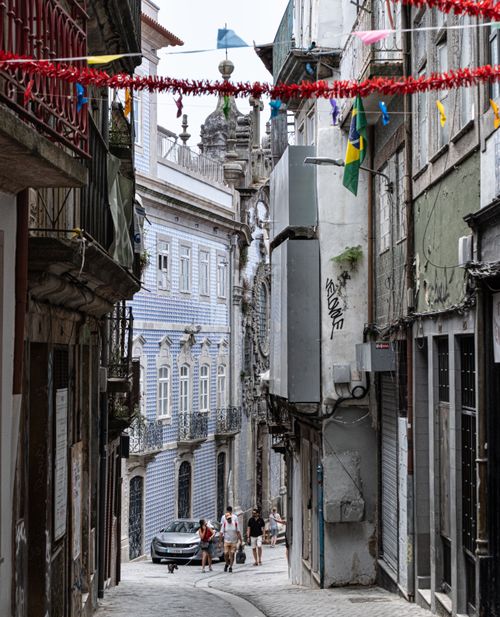 Free Charming alley in Porto with traditional architecture, perfect for exploring Portugal's rich history. Stock Photo
