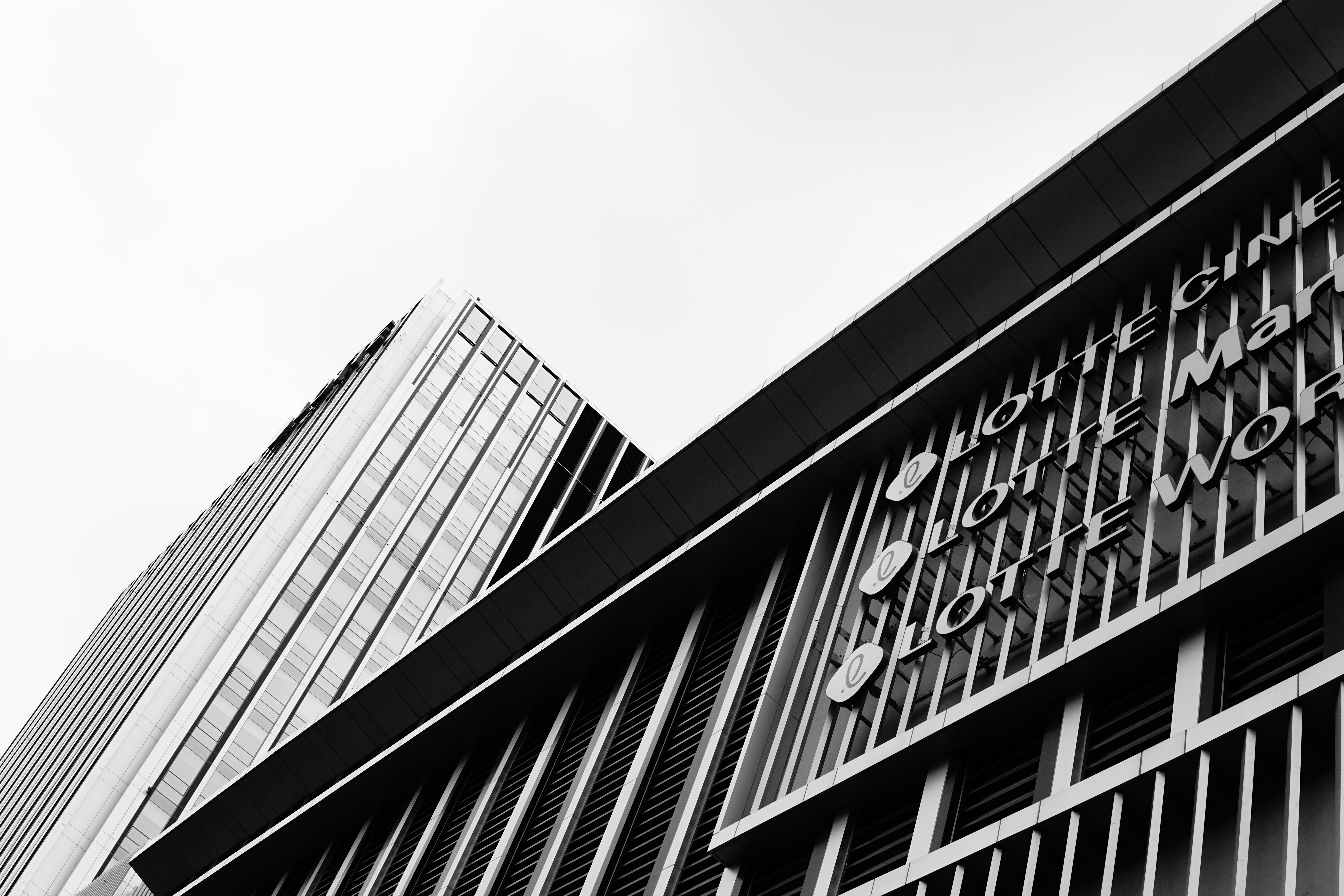 Black and white photo of modern architecture in Hà Nội, Vietnam, highlighting geometric designs.