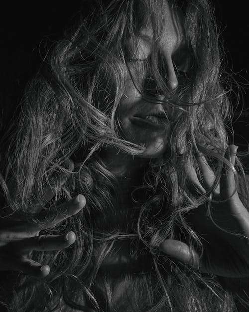 Free Grayscale Photo Of Woman With Hair On Her Face Stock Photo