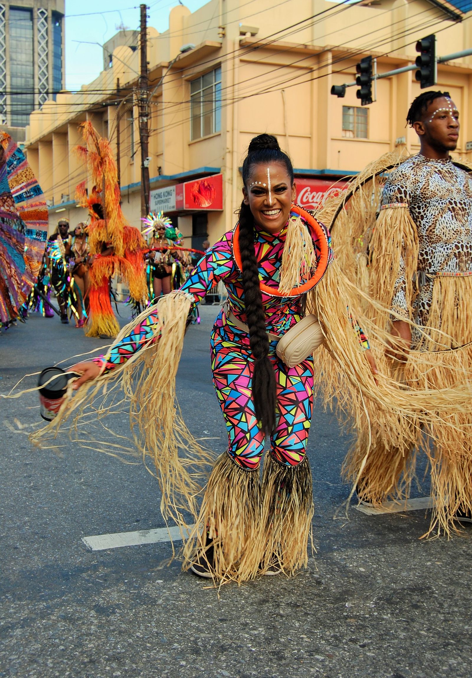 People participating in a colorful Caribbean cultural celebration