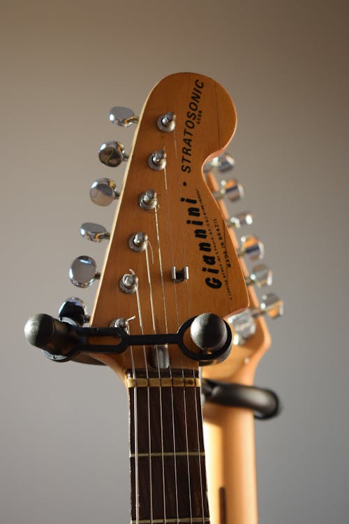 Free Brown and Black Guitar Headstock Stock Photo