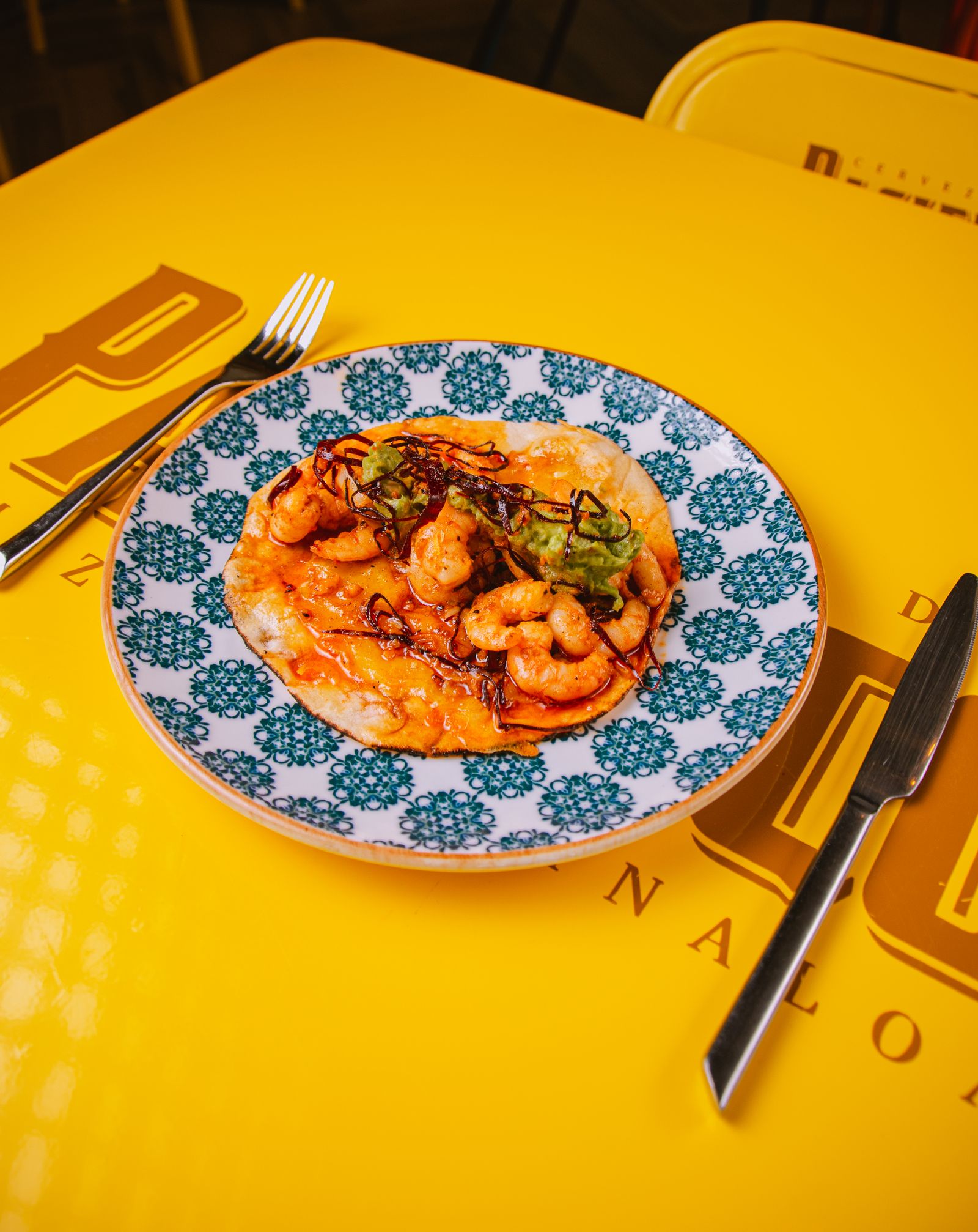 Delicious shrimp tacos served on a colorful plate