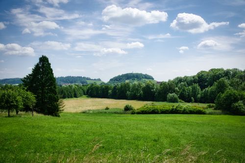 Free Lush green fields under a bright blue sky in Zaberfeld, Germany, perfect for nature lovers. Stock Photo