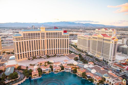 Free Captivating aerial photo of Las Vegas featuring iconic Bellagio and Caesar's Palace at sunset. Stock Photo