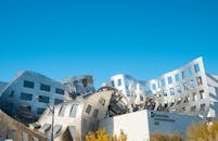 Contemporary quaint building of Lou Ruvo Center exterior with creative bendy walls on sunny day
