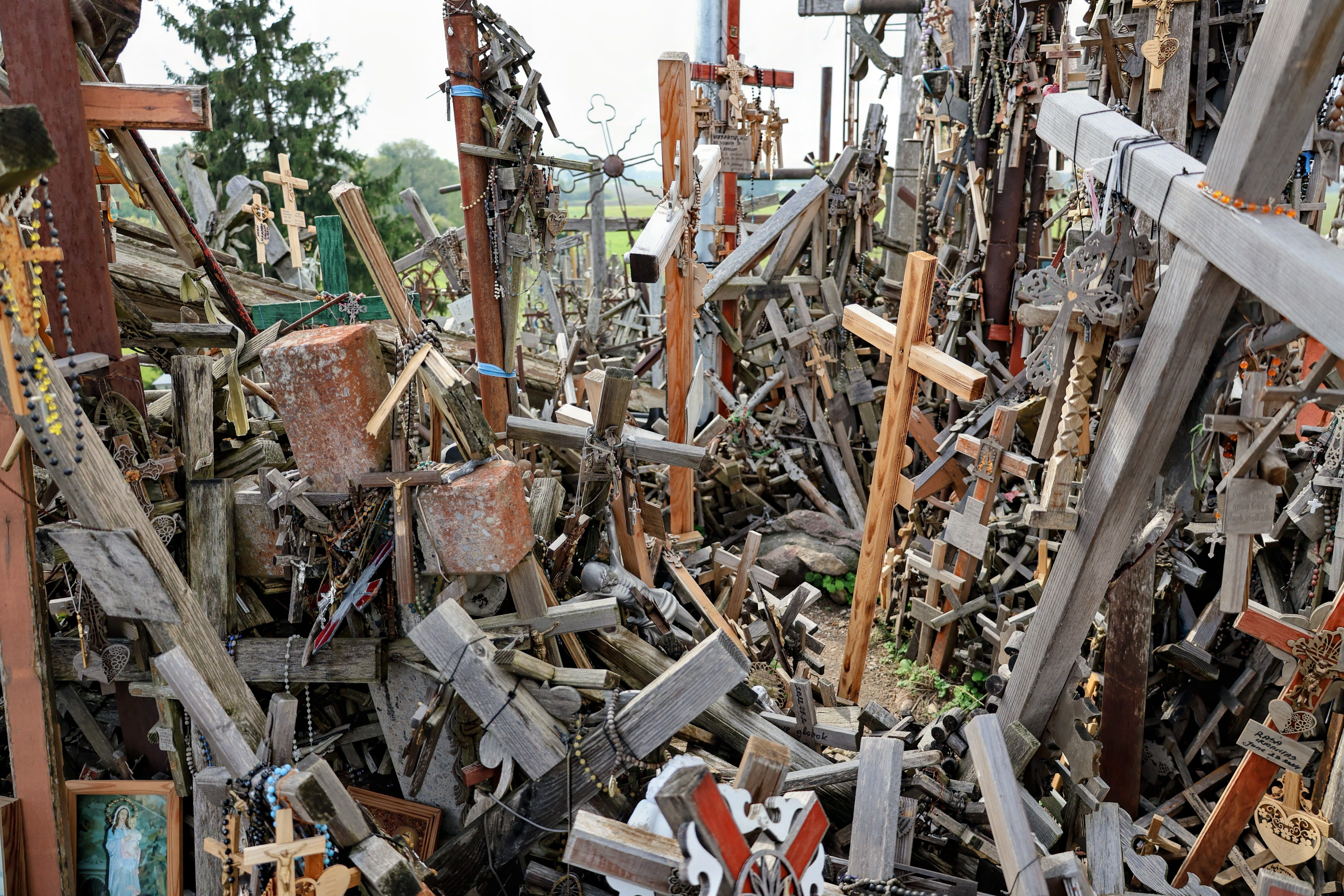 A multitude of crosses at the famous Hill of Crosses in Lithuania, symbolizing hope and devotion.