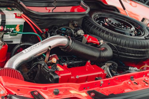 Free Detailed view of a car engine compartment with spare tire visible in Natal, Brazil. Stock Photo