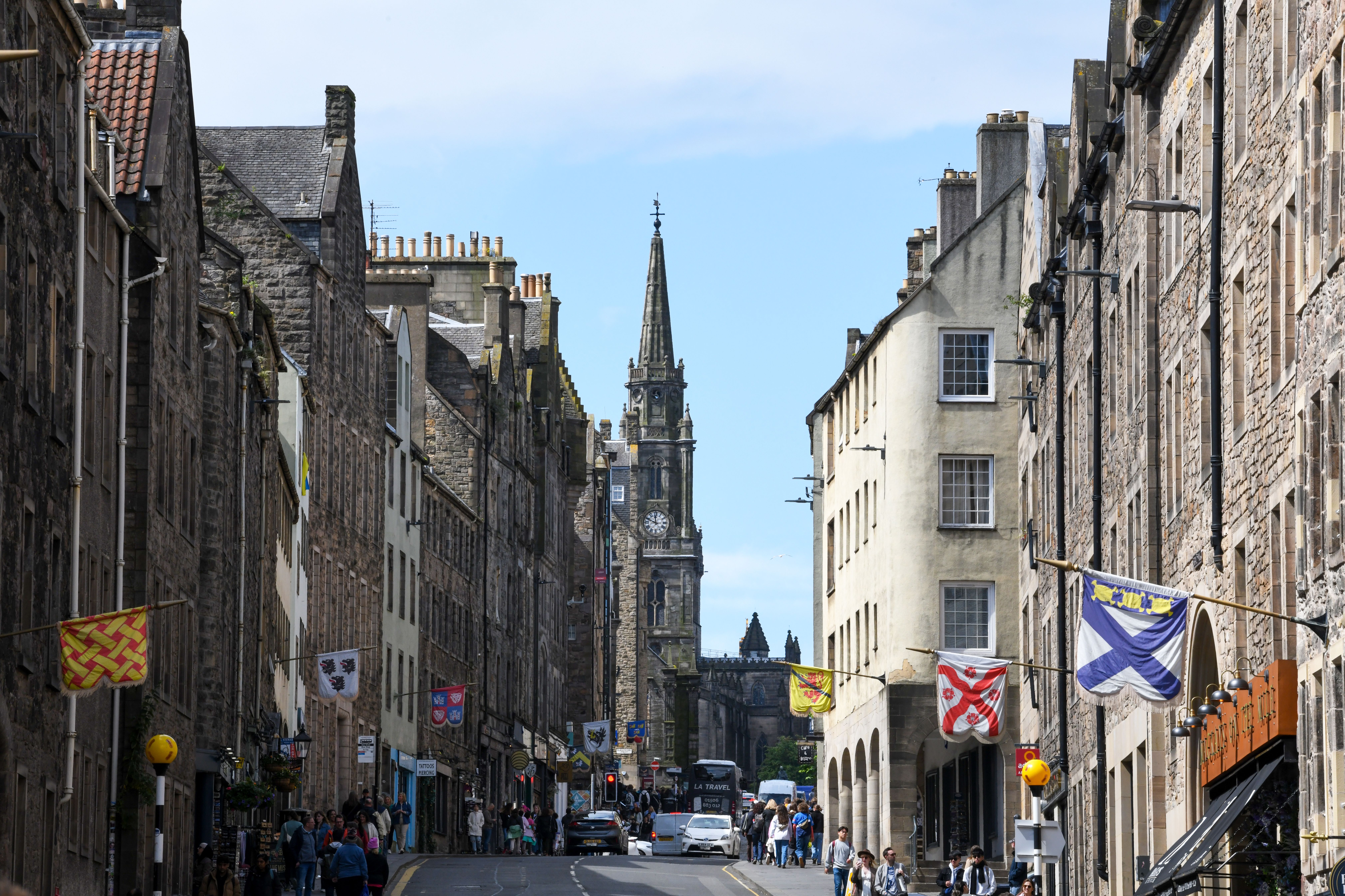 Stunning daytime view of the historic Royal Mile in Edinburgh, capturing its charm and architecture.