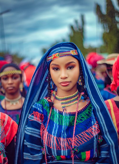 Free Colorful portrait of women in traditional Nigerian attire at a cultural festival. Stock Photo