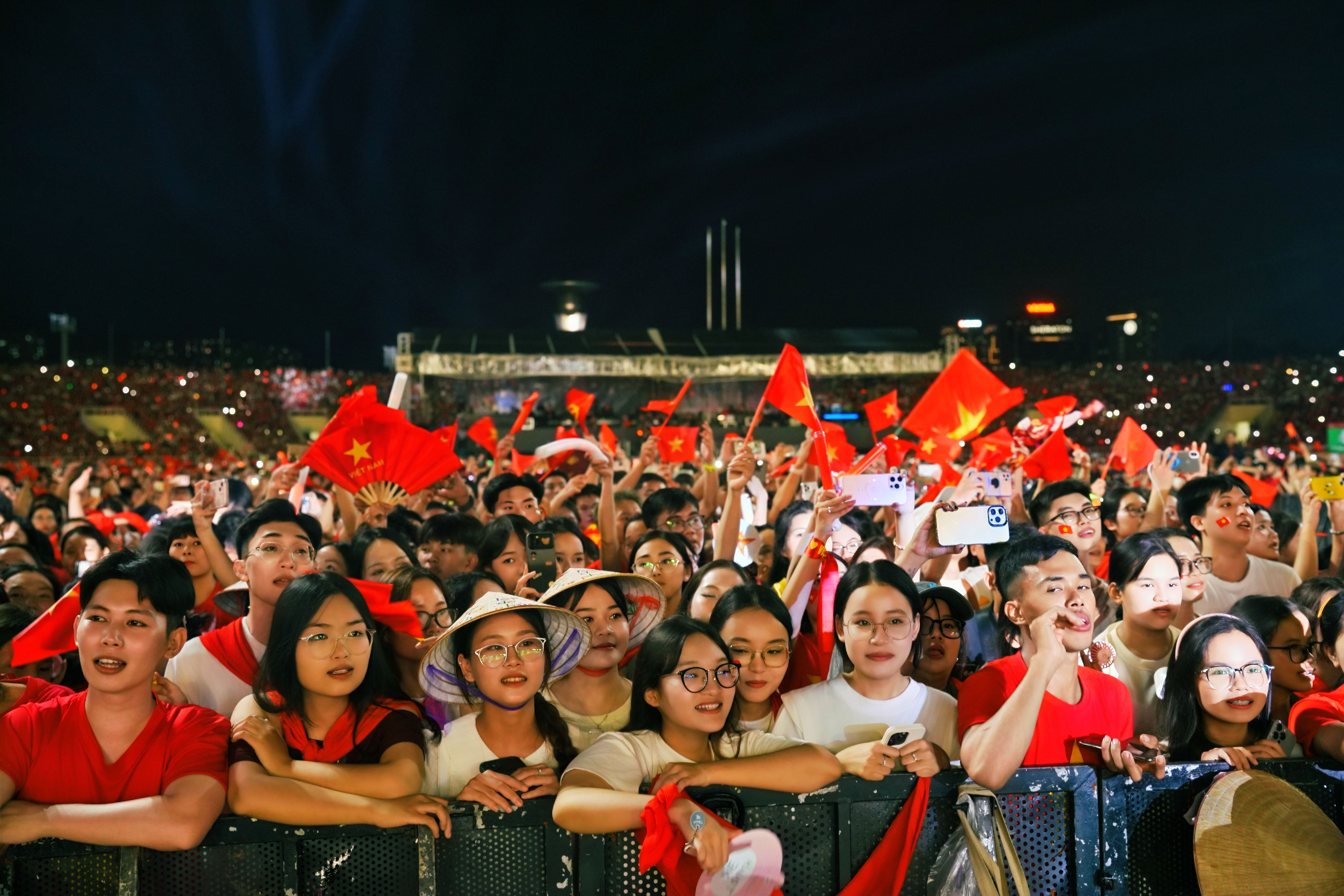 supporter using a time-zone converter beside a UEFA Champions League schedule marked August 27