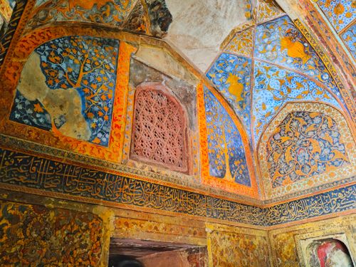 Free Intricate Mughal interior with decorative tiles and floral patterns in Agra, India. Stock Photo