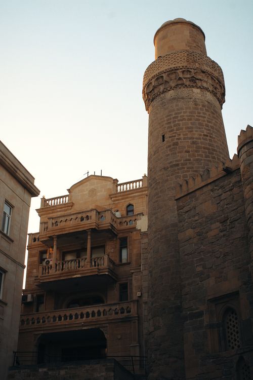Free A stunning view of traditional architecture during sunset in an old city. Stock Photo