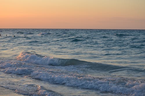 Fotos de stock gratuitas de mar, playa, puesta de sol