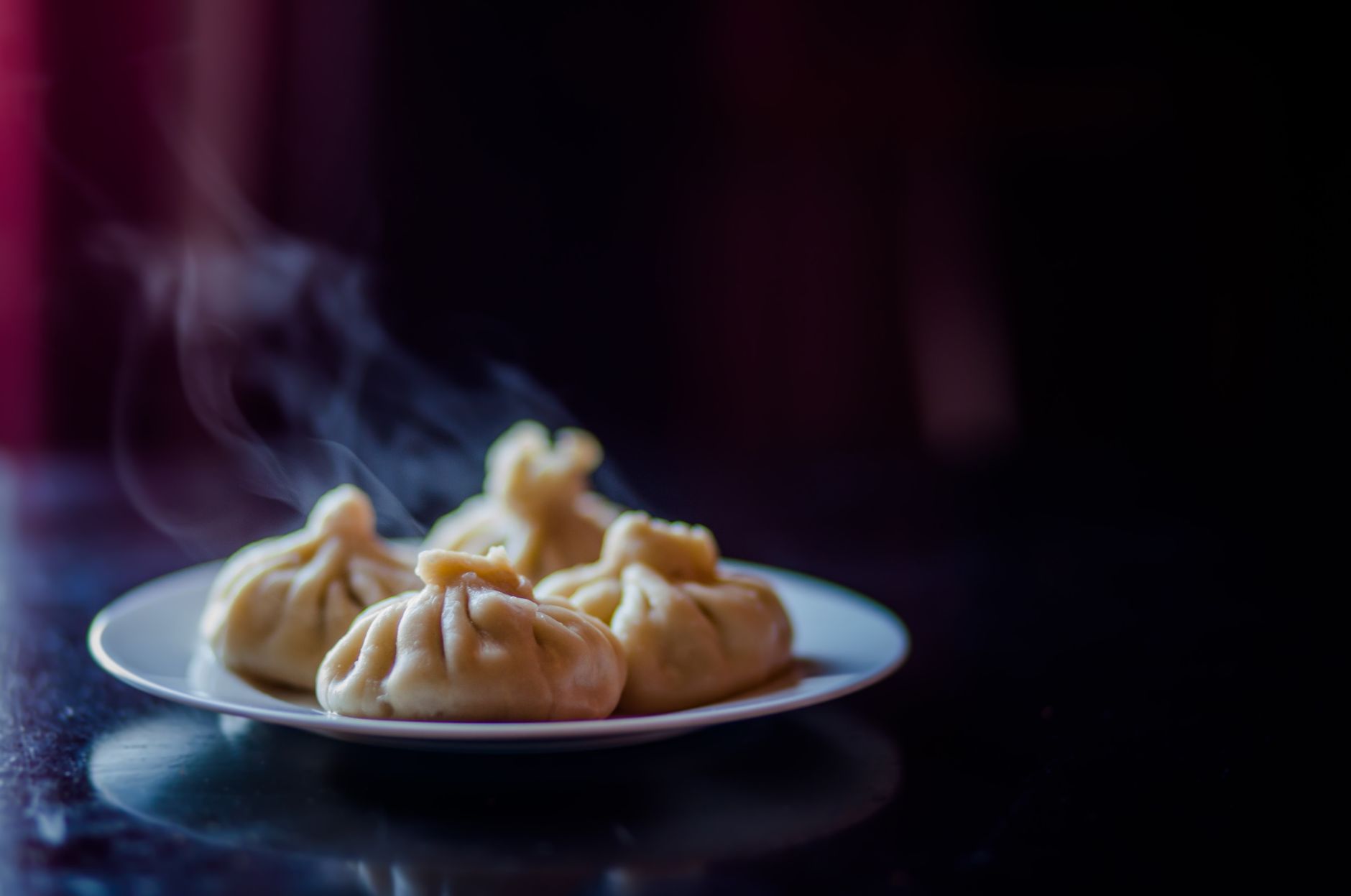 Steamed Momo Tibetan Dumplings served with tomato sauce