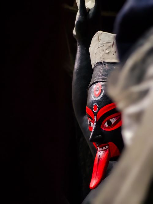 Free Close-up of a vibrant Kali statue showcasing intricate red and black color patterns. Stock Photo