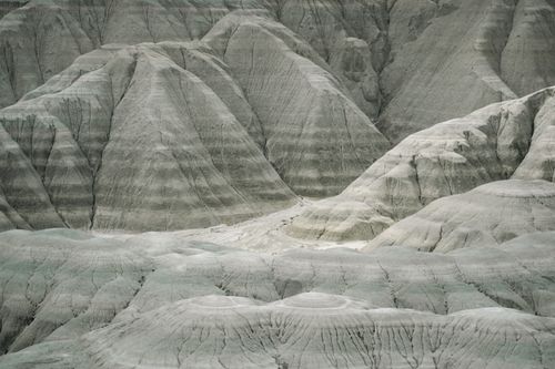 Free Stunning barren rock formations in Badlands National Park, showcasing unique geological patterns and textures. Stock Photo