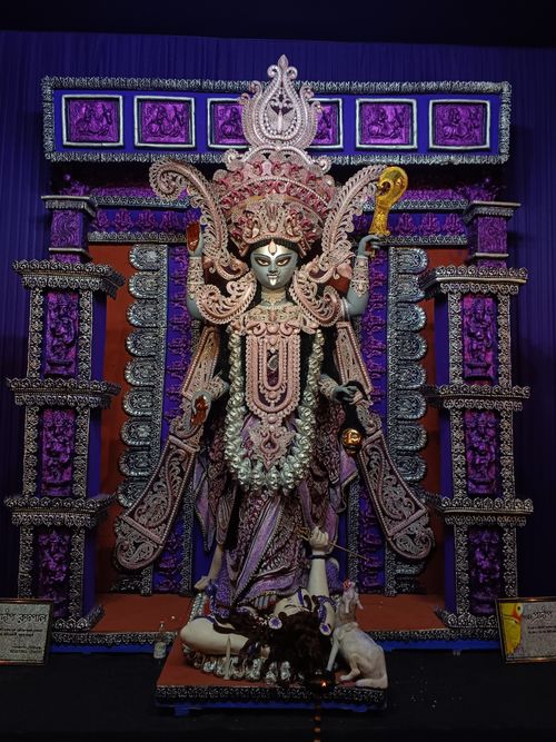 Free Detailed view of a Durga idol with ornate decorations, representing Hindu culture. Stock Photo