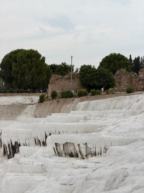 Free Explore the breathtaking natural travertine terraces at Pamukkale, Turkey, a UNESCO World Heritage Site. Stock Photo