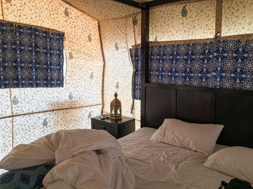 Free A cozy bedroom with traditional decor and a lantern, located in Diu, India. Stock Photo