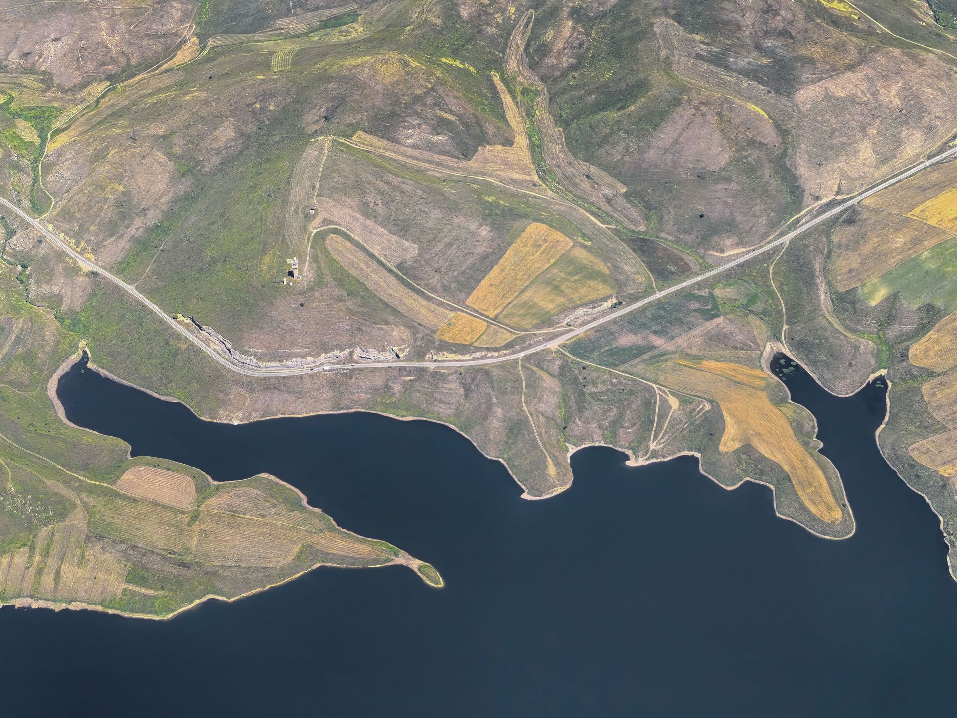 Aerial view of hills and a reservoir