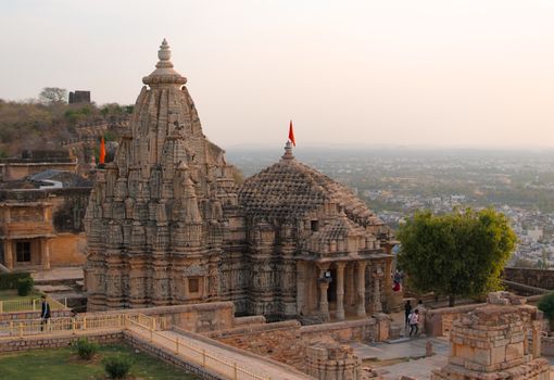 View of a historic temple at Chittorgarh Fort, Rajasthan, India during sunset.