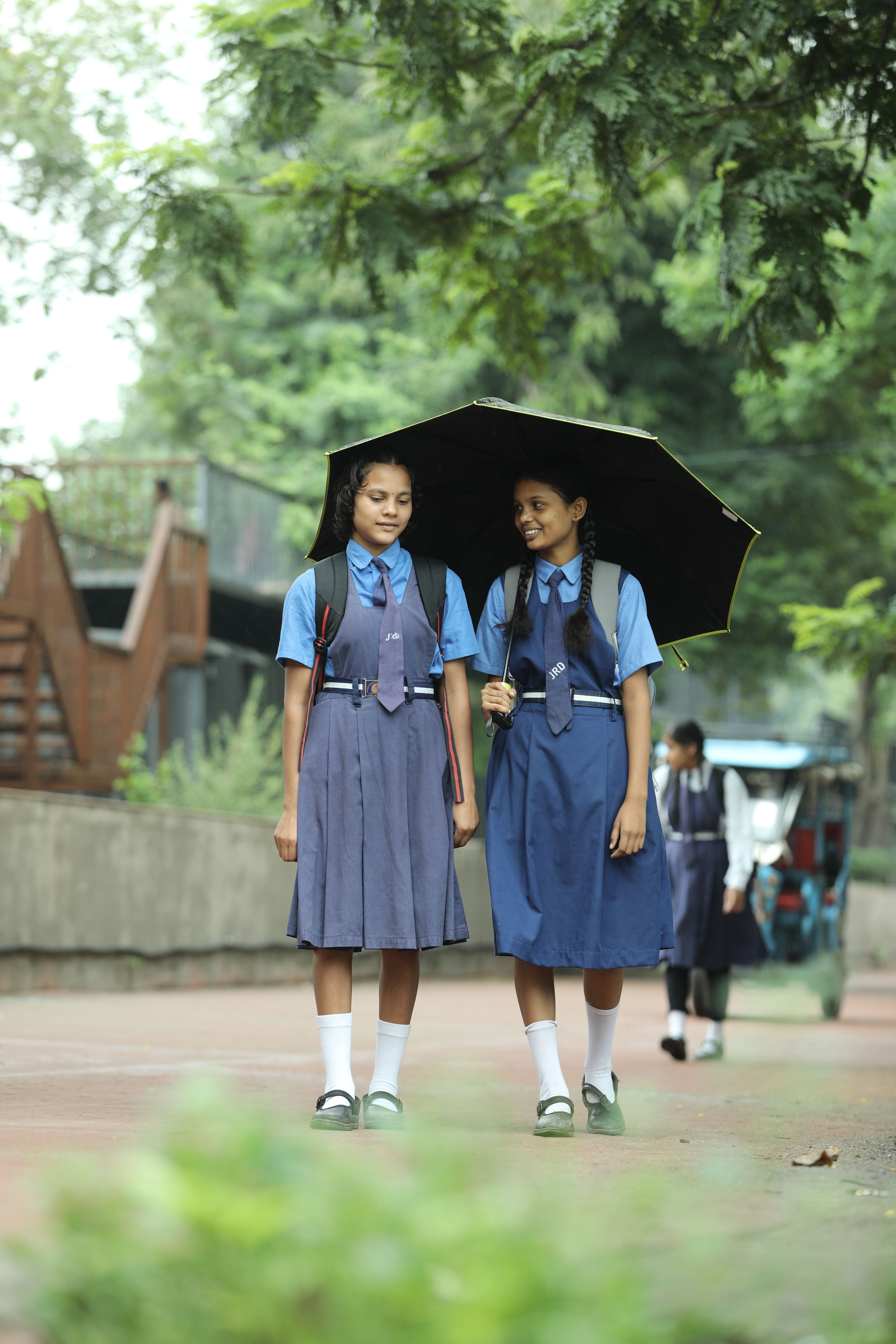 free-photo-of-schoolgirls-walking-under-umbrella-on-rainy-day.jpeg?auto=compress\u0026w=1600