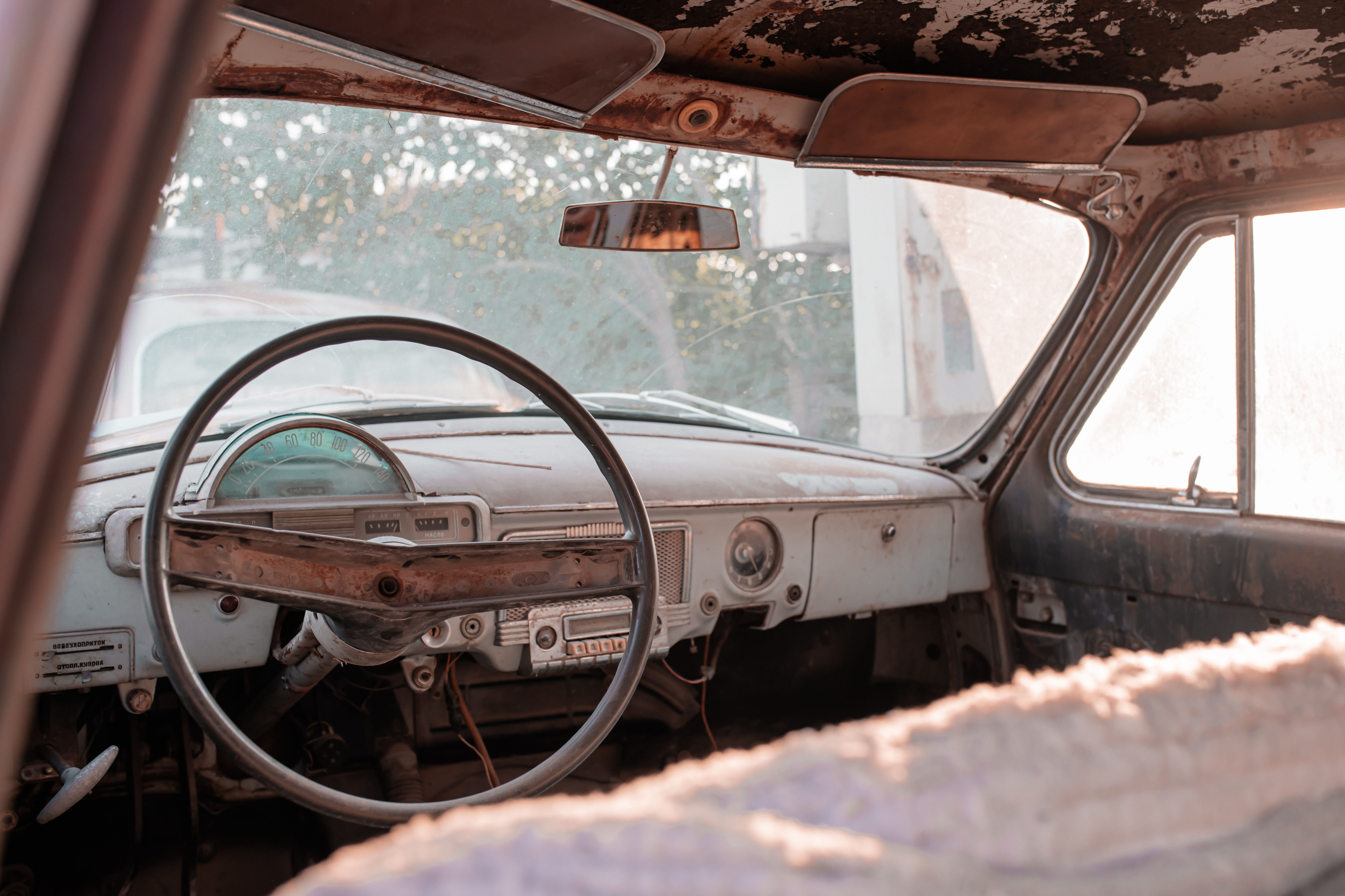 used car interior worn steering wheel