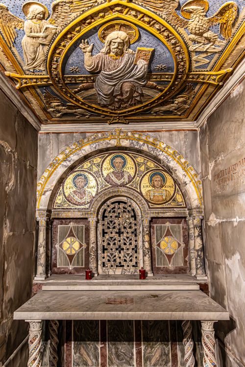 Free Detailed view of a historic church's intricate mosaics and ceiling art in Rome, Italy. Stock Photo