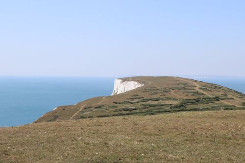 Free Breathtaking view of chalk cliffs and blue sea at the English Channel with clear skies. Stock Photo