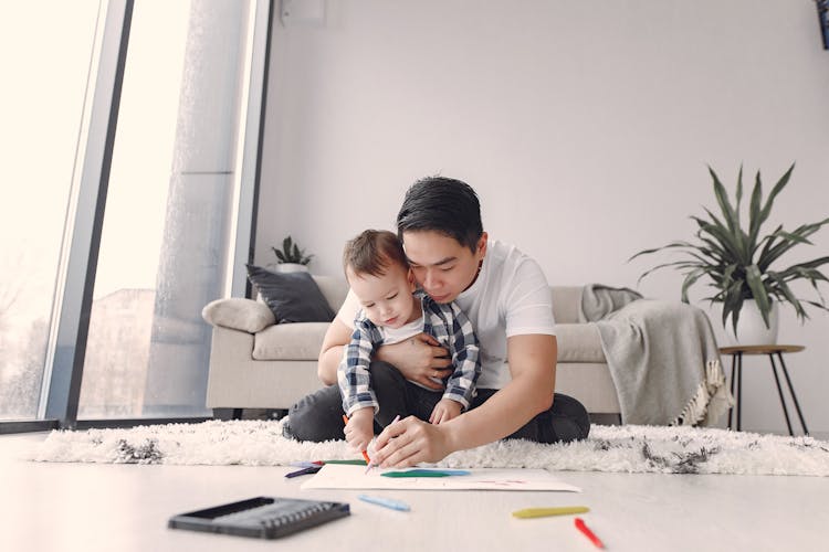 Father And Son Doing Arts And Craft