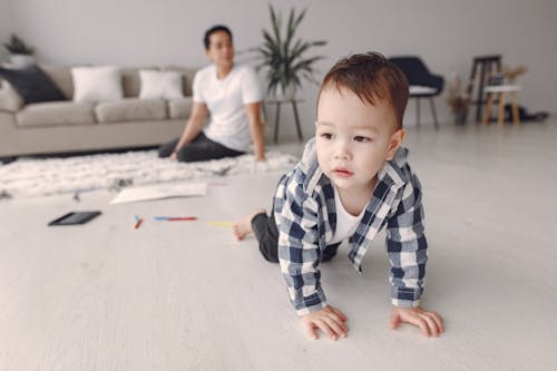 Free Little Boy Crawling On The Floor Stock Photo