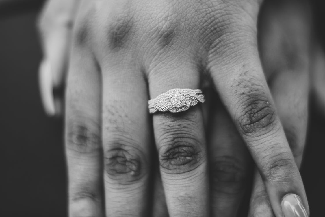 Grayscale Photo of a Diamond Ring