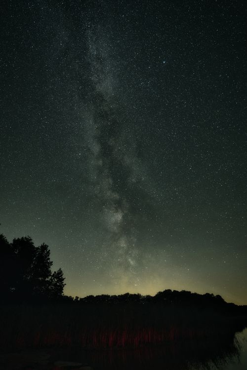Free Breathtaking view of the Milky Way galaxy in the night sky over Brandenburg, Germany. Stock Photo
