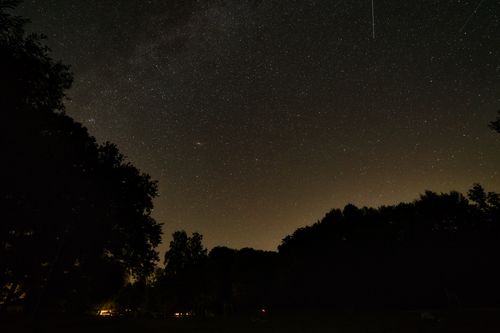 Free A stunning starry sky captured over Brandenburg, Germany, showcasing the beauty of the night. Stock Photo
