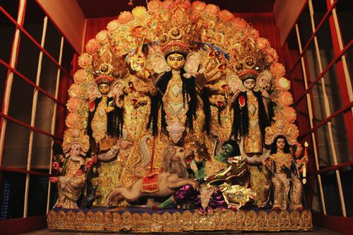 Free Colorful and detailed Durga Puja idol display in Kolkata, India, showcasing traditional craftsmanship. Stock Photo