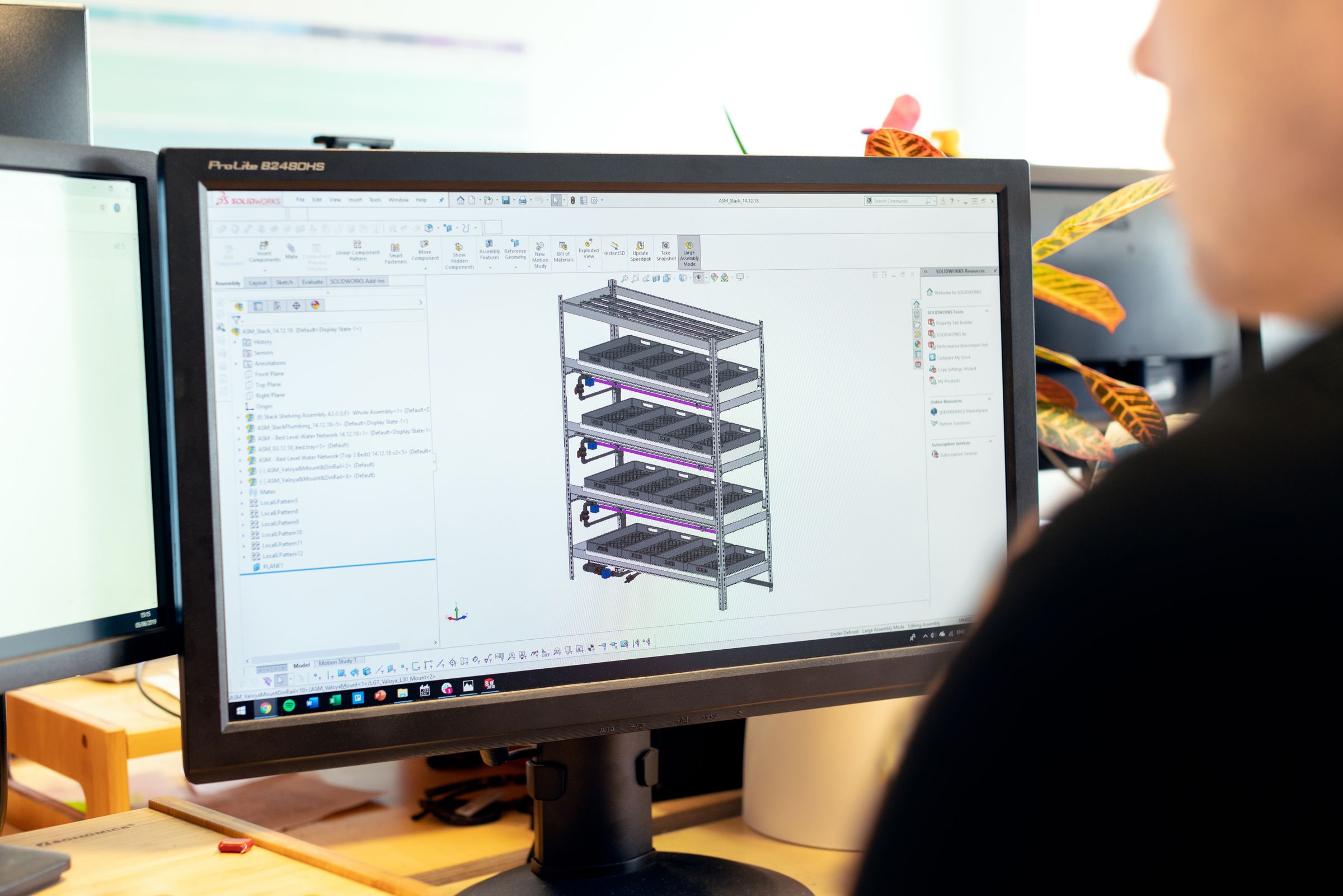 Automotive engineer reviewing 3D product design and surface modeling