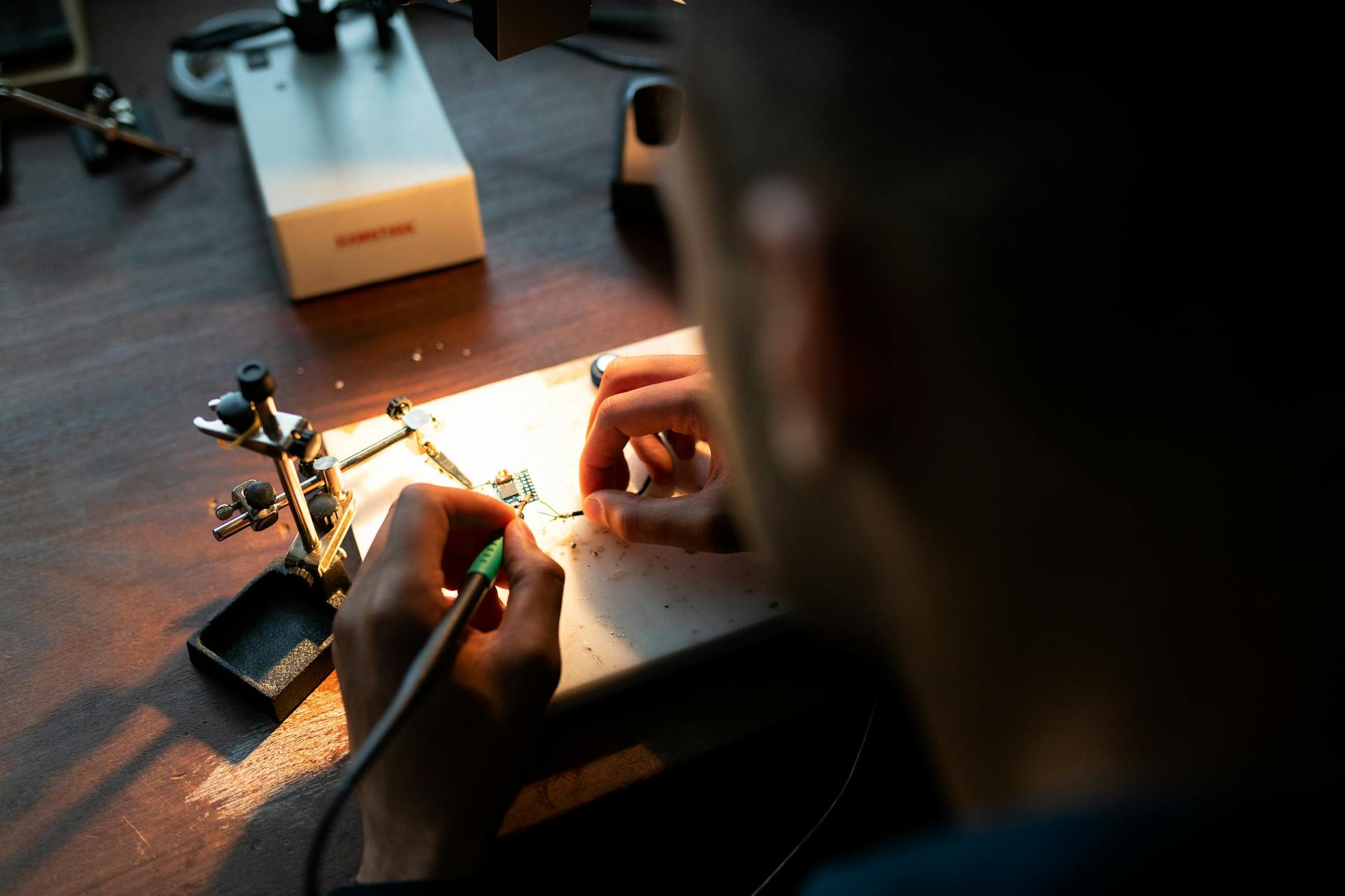 Mechanical Engineer Soldering in Workshop