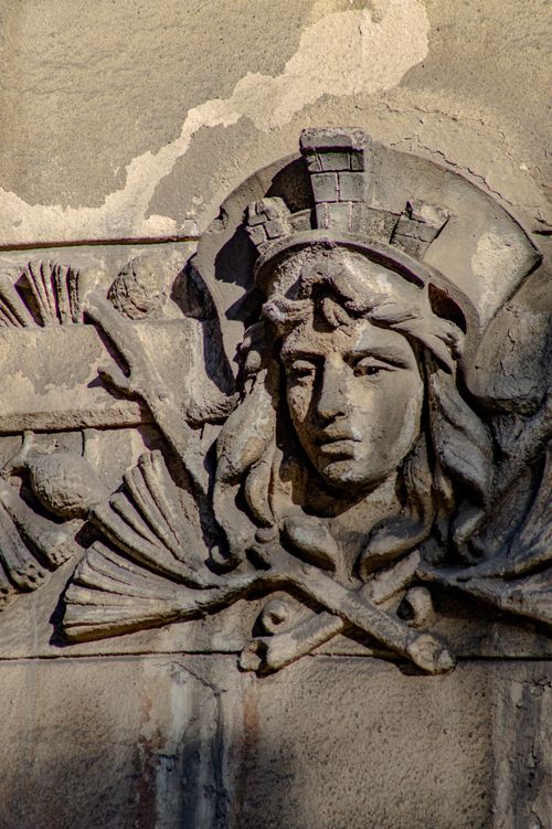 Free Close-up of intricate stone carving on a historic building facade in Lviv, Ukraine, showcasing classical design elements. Stock Photo